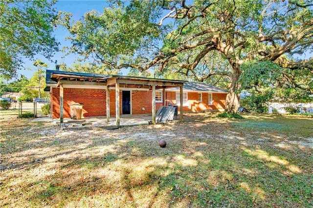 back of house featuring a patio