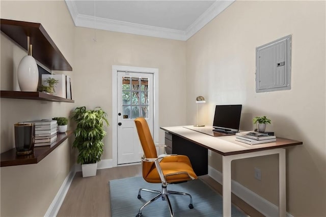 office area featuring baseboards, crown molding, electric panel, and wood finished floors