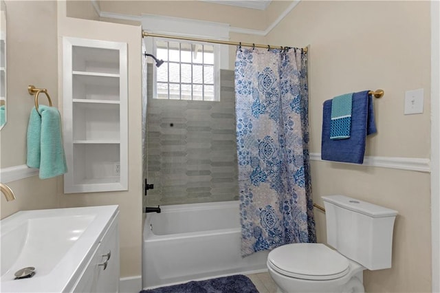 full bathroom featuring crown molding, toilet, shower / tub combo, and vanity