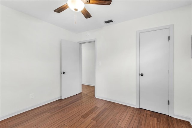 unfurnished bedroom featuring ceiling fan and light hardwood / wood-style flooring