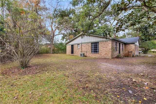 view of side of property featuring cooling unit