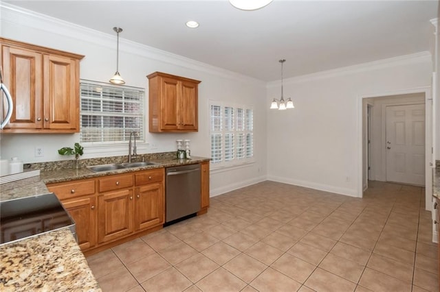 kitchen featuring crown molding, hanging light fixtures, appliances with stainless steel finishes, brown cabinetry, and a sink