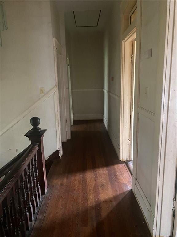 1902 Calmes St, Mobile, AL 36606 - corridor featuring dark wood-style floors and attic access