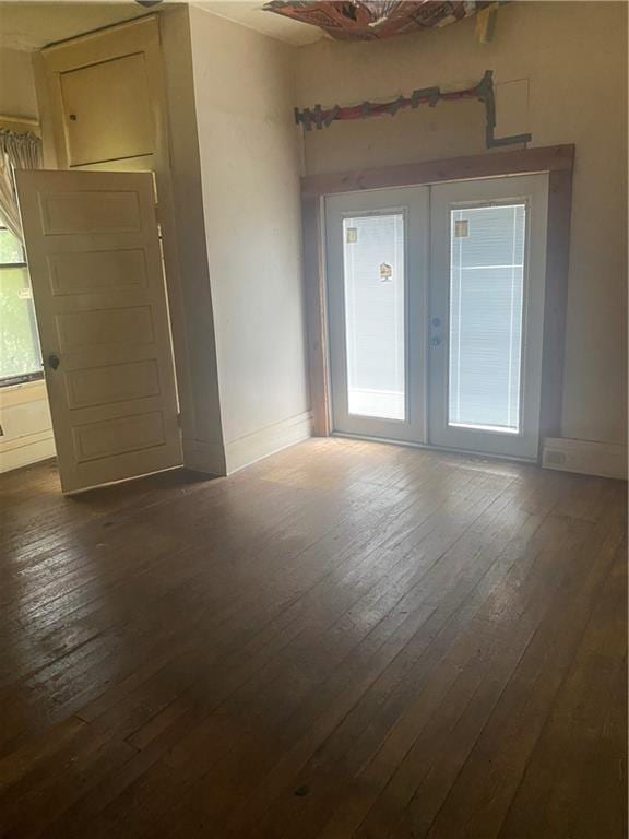 1902 Calmes St, Mobile, AL 36606 - unfurnished room with dark wood finished floors and french doors