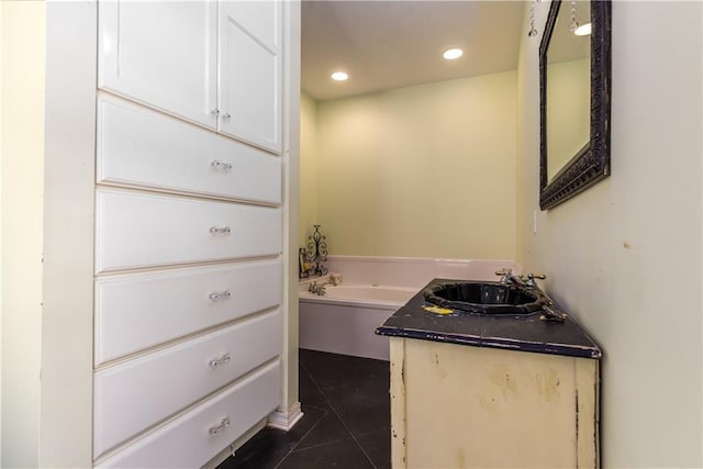 510 Fort Mims Pl, Dauphin Island, AL 36528 - bathroom featuring a bath, tile patterned floors, recessed lighting, and vanity