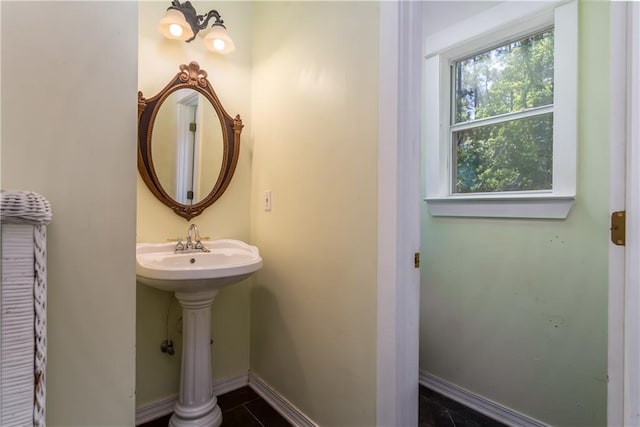 510 Fort Mims Pl, Dauphin Island, AL 36528 - bathroom featuring a sink, baseboards, and tile patterned flooring