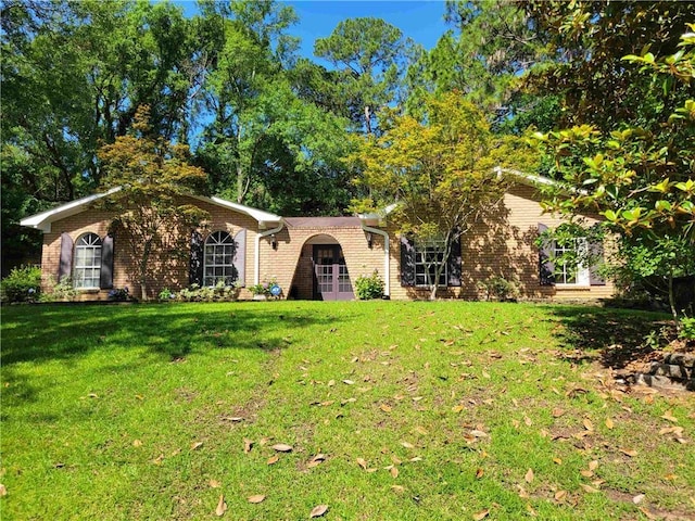 2544 Buckboard Ct, Mobile, AL 36695 - view of front of house with a front lawn and brick siding