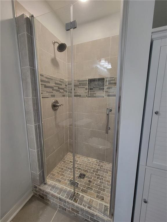 2544 Buckboard Ct, Mobile, AL 36695 - bathroom with a stall shower and baseboards