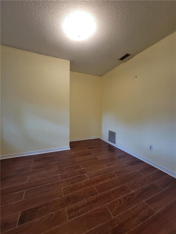 2544 Buckboard Ct, Mobile, AL 36695 - unfurnished room featuring wood tiled floors, a textured ceiling, and baseboards