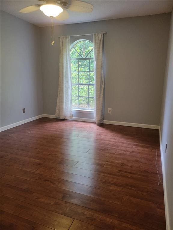 2544 Buckboard Ct, Mobile, AL 36695 - unfurnished room with dark wood-type flooring, a ceiling fan, and baseboards