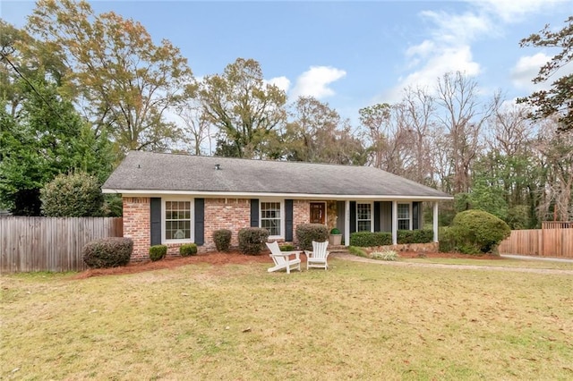 single story home with a front lawn