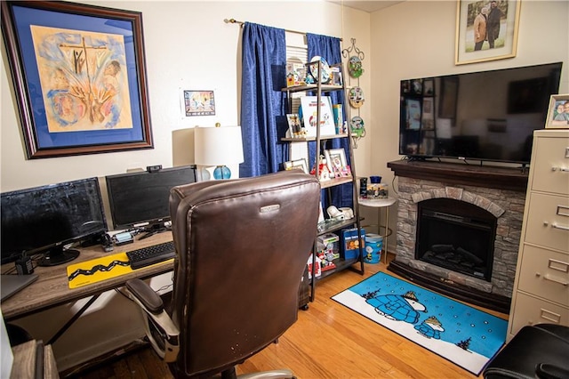 612 Summerland Dr, Mobile, AL 36617 - home office with wood finished floors and a fireplace
