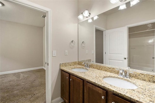 2151 Elliott Ct, Mobile, AL 36695 - full bath with double vanity, baseboards, and tub / shower combination