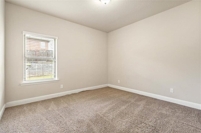 2151 Elliott Ct, Mobile, AL 36695 - spare room with carpet, healthy amount of natural light, and baseboards