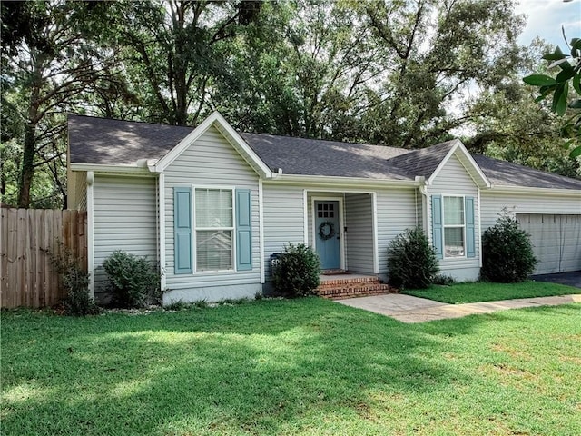 2555 E Rd, Mobile, AL 36693 - ranch-style home with a garage and roof with shingles