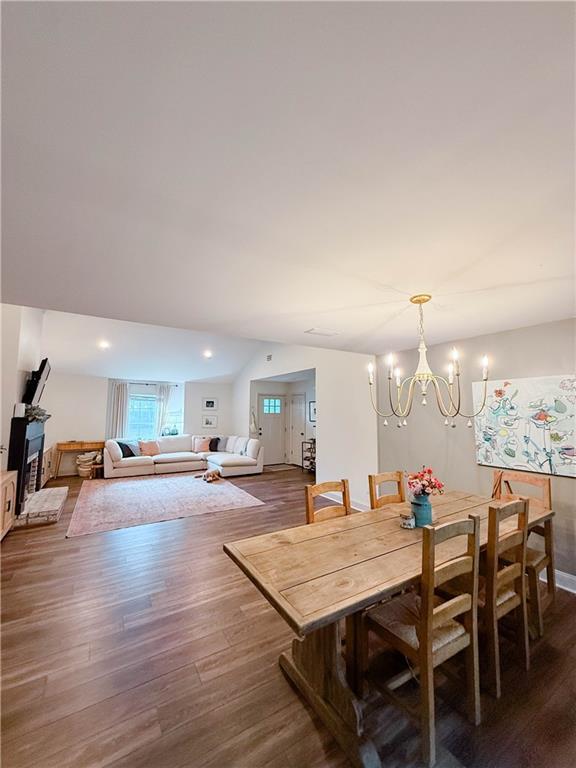 2555 E Rd, Mobile, AL 36693 - dining space featuring dark wood finished floors, a chandelier, and recessed lighting