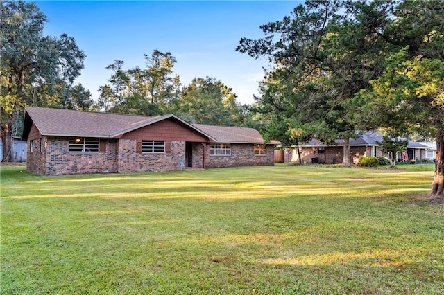 view of front of property with a front lawn