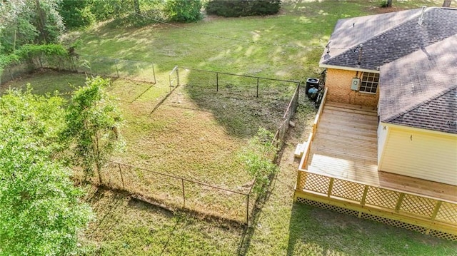 view of yard with a deck and a fenced backyard