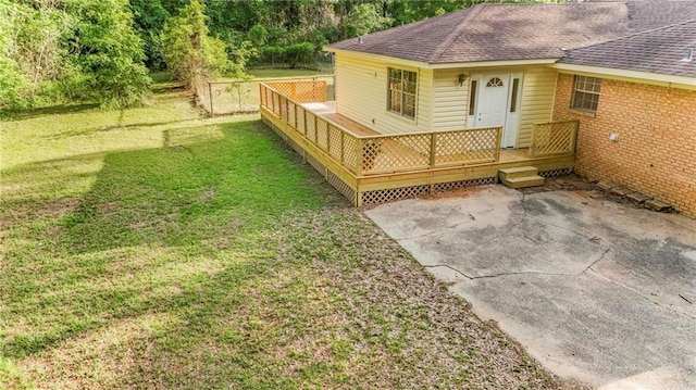 exterior space with a lawn and a patio