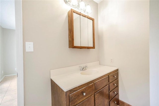 bathroom featuring vanity and baseboards