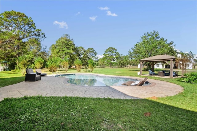 view of pool with a gazebo, a yard, and a patio