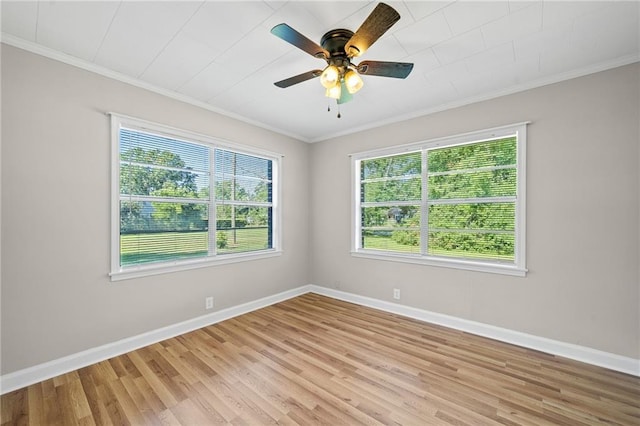 unfurnished room with ceiling fan, light hardwood / wood-style floors, and ornamental molding