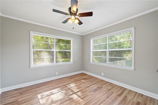 unfurnished room with ceiling fan, light hardwood / wood-style floors, and crown molding