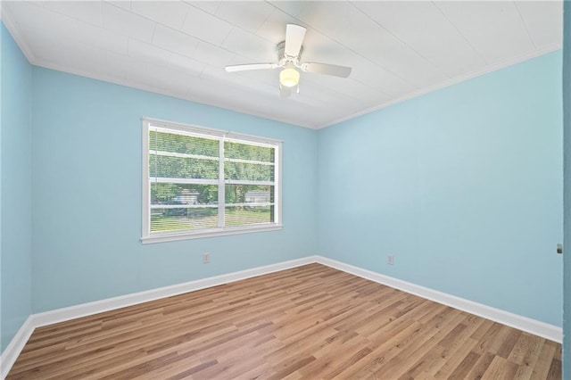 spare room with ceiling fan, light hardwood / wood-style floors, and ornamental molding