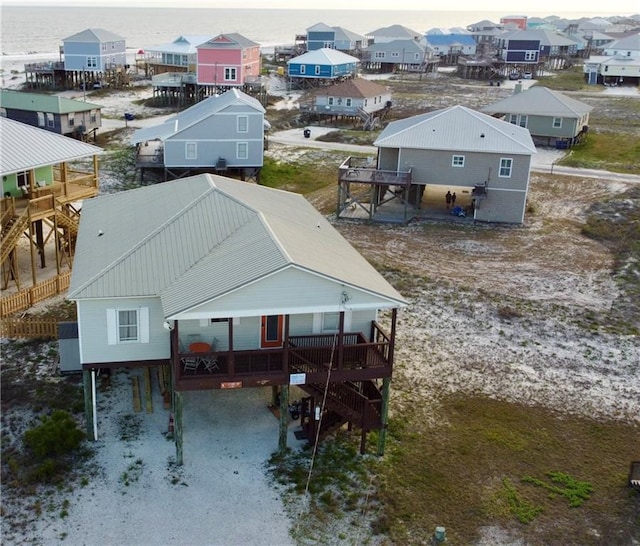 birds eye view of property with a residential view