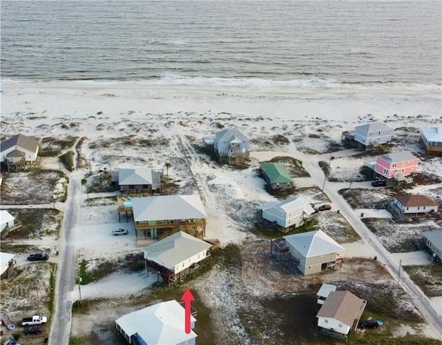 aerial view with a beach view and a water view
