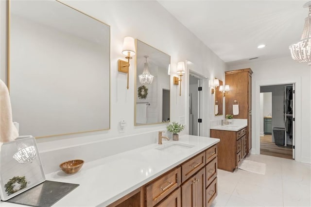 3699 Elysian Fields Dr, Saraland, AL 36571 - full bathroom featuring a chandelier, vanity, marble finish floors, and recessed lighting