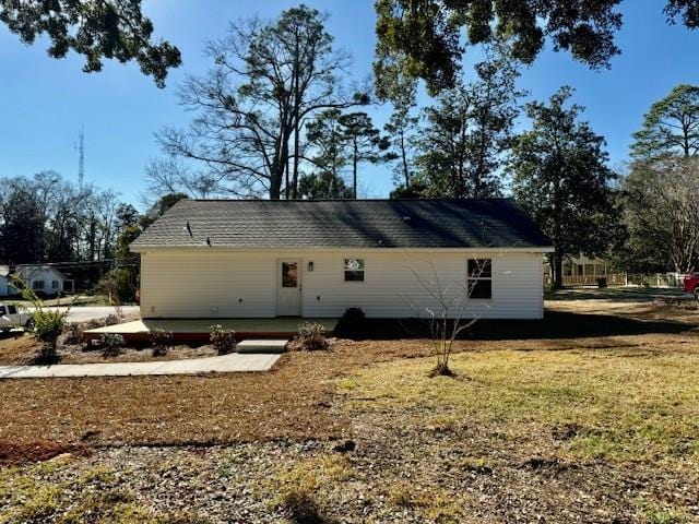 view of home's exterior with a yard