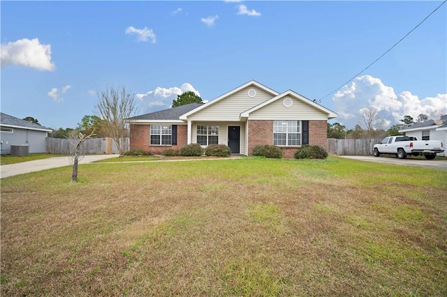 ranch-style home featuring a front lawn