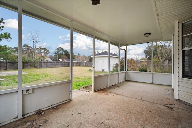 unfurnished sunroom featuring plenty of natural light