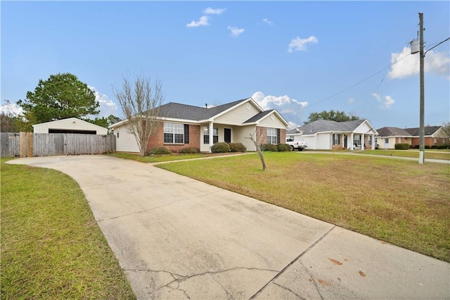 ranch-style home featuring a front yard