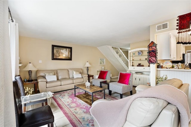 living room with light tile flooring