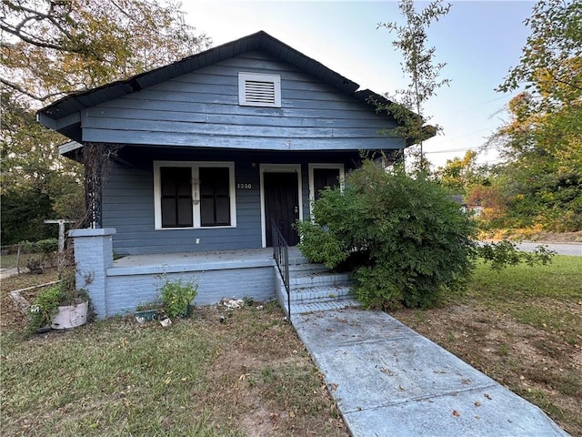 bungalow-style home featuring a porch