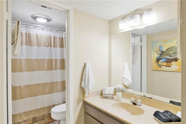 204 Golf Ter Unit 204, Daphne, AL 36526 - full bath featuring toilet, vanity, a textured ceiling, and curtained shower
