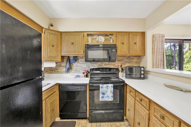 204 Golf Ter Unit 204, Daphne, AL 36526 - kitchen with black appliances, light countertops, and tasteful backsplash