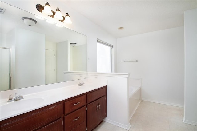 full bathroom with a sink, double vanity, a bath, and visible vents
