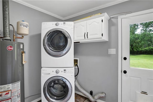 3011 Olde Gate Rd, Mobile, AL 36695 - washroom featuring water heater, stacked washer / drying machine, plenty of natural light, cabinet space, and ornamental molding