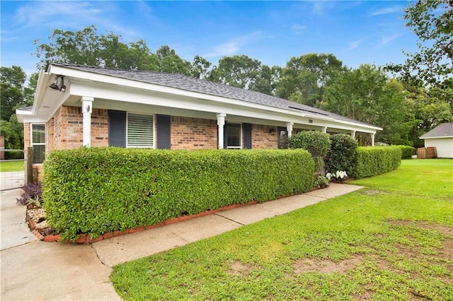 3011 Olde Gate Rd, Mobile, AL 36695 - view of property exterior with a yard and brick siding