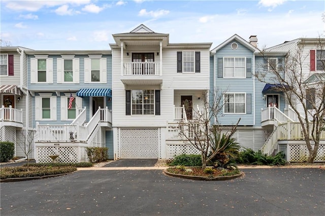 view of property featuring aphalt driveway