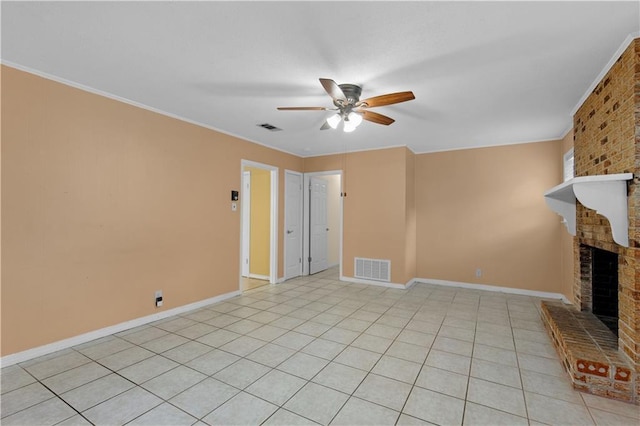 unfurnished living room featuring visible vents, light tile patterned floors, baseboards, a brick fireplace, and ceiling fan