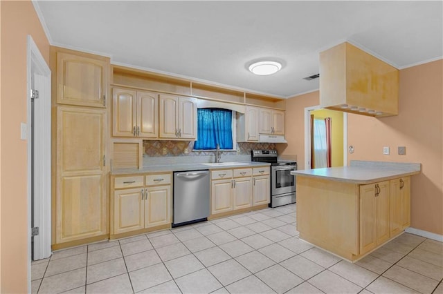 kitchen featuring light countertops, a peninsula, light brown cabinetry, and stainless steel appliances
