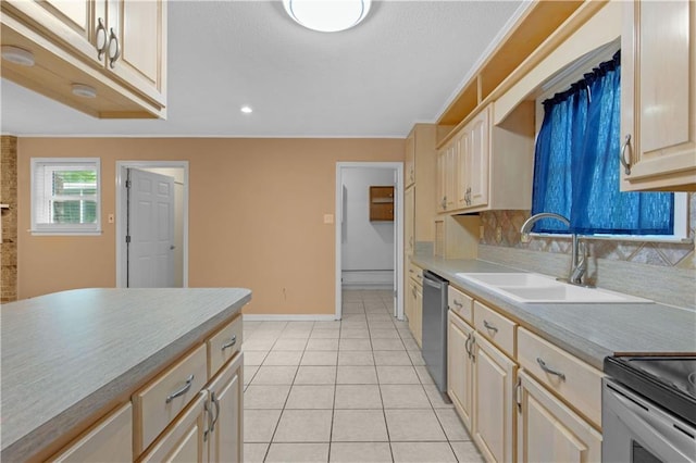 kitchen featuring tasteful backsplash, light tile patterned floors, light countertops, stainless steel appliances, and a sink
