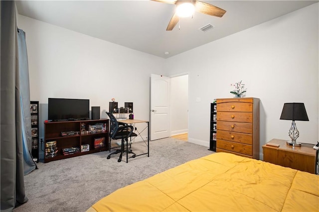 bedroom featuring visible vents, carpet flooring, and a ceiling fan
