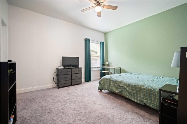 bedroom featuring baseboards, carpet, and a ceiling fan