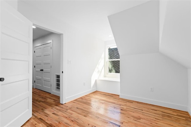 additional living space with light wood-type flooring