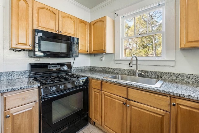 kitchen with ornamental molding, a sink, light stone counters, black appliances, and light tile patterned floors